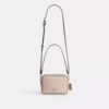 Mini Carey Crossbodytas van Signature Canvas