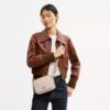 Mini Carey Crossbodytas van Signature Canvas