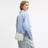 Mini Carey Crossbodytas van Signature Canvas