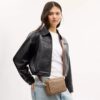 Mini Carey Crossbodytas van Signature Canvas