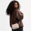 Mini Carey Crossbodytas van Signature Canvas