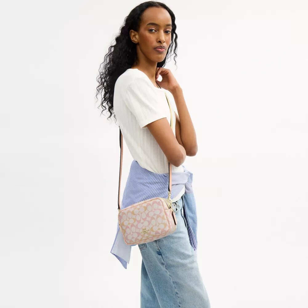 Mini Carey Crossbodytas van Signature Canvas