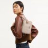 Mini Carey Crossbodytas van Signature Canvas