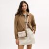 Mini Carey Crossbodytas van Signature Canvas
