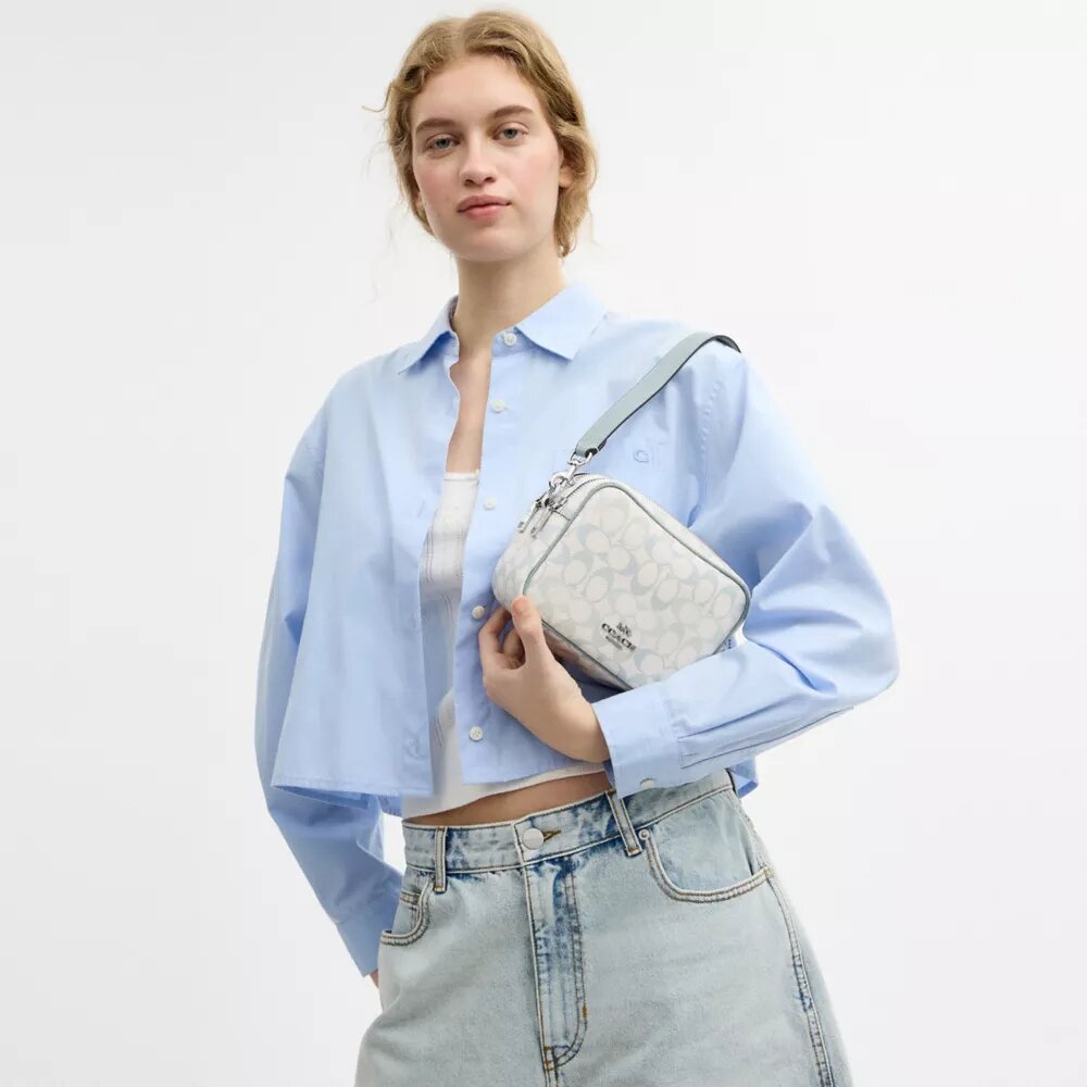 Mini Carey Crossbodytas van Signature Canvas