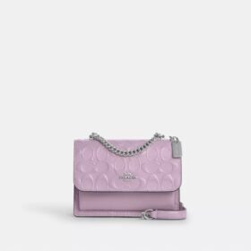 Mini Klare-crossbodytas van kenmerkend leer
