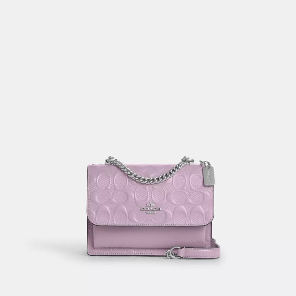 Mini Klare-crossbodytas van kenmerkend leer