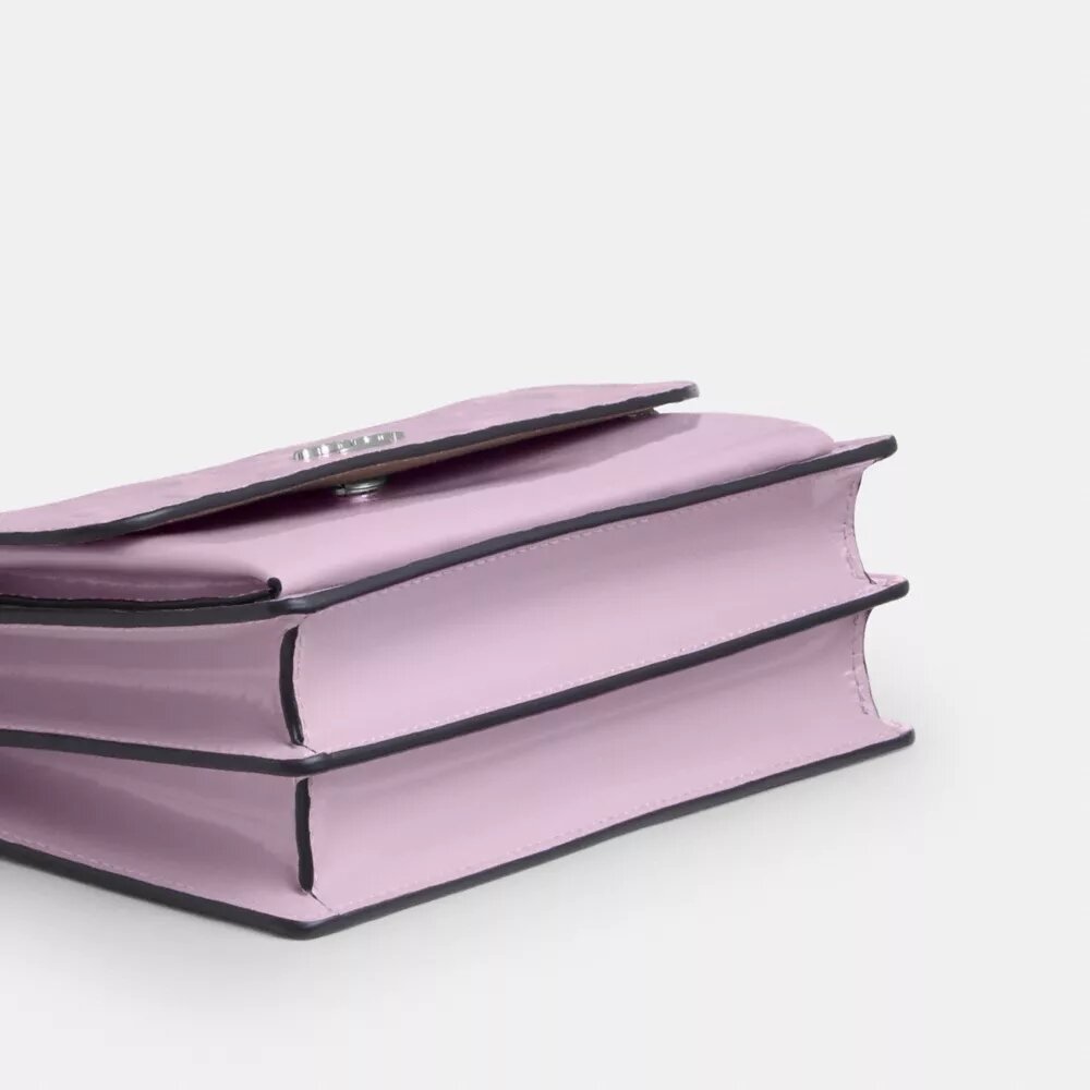 Mini Klare-crossbodytas van kenmerkend leer