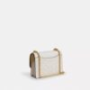 Mini Klare-crossbodytas van Signature Canvas