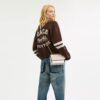 Mini Klare-crossbodytas van Signature Canvas