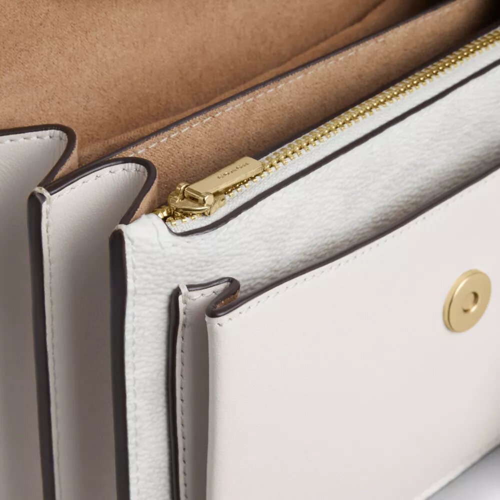 Mini Klare-crossbodytas van Signature Canvas