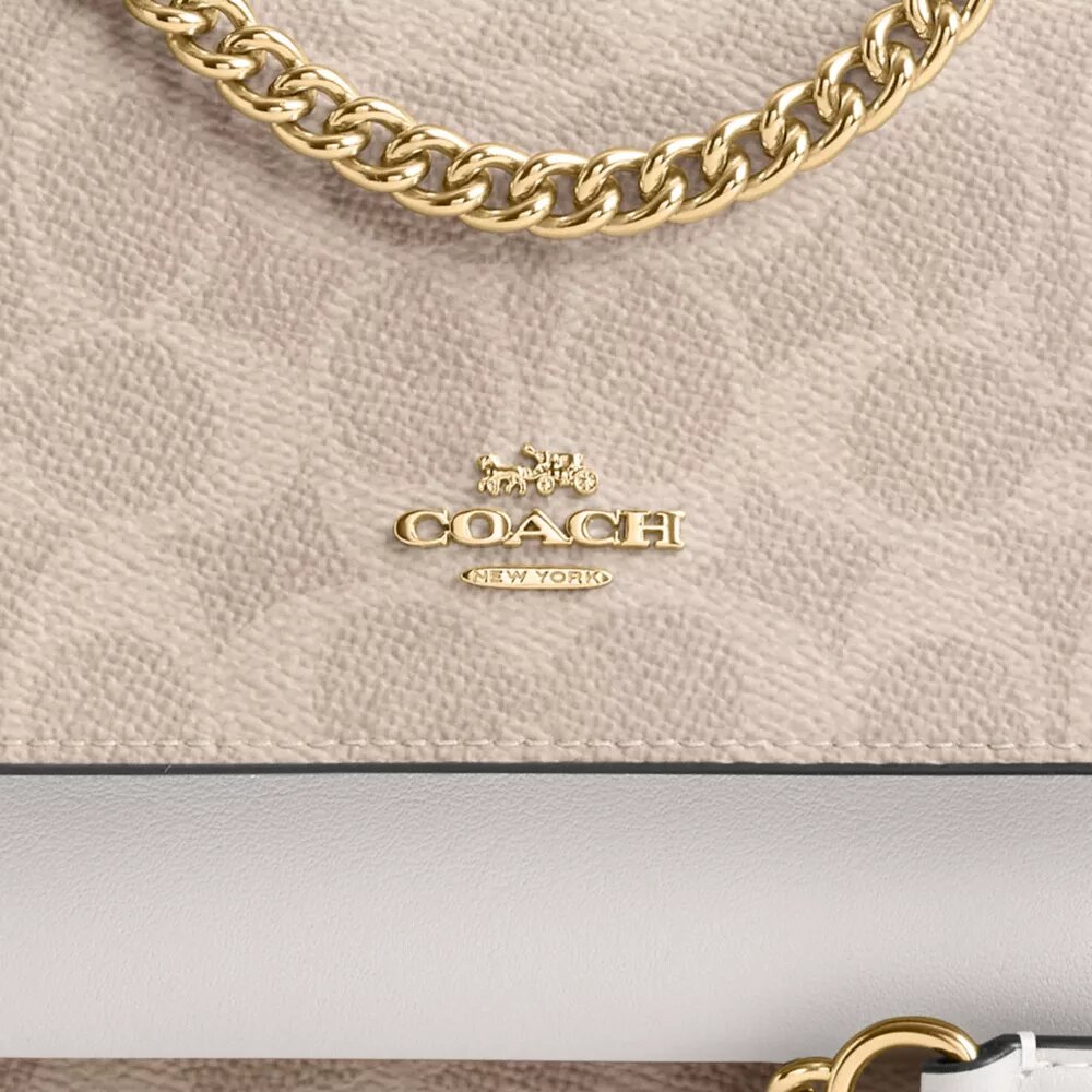 Mini Klare-crossbodytas van Signature Canvas