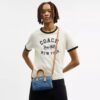 Mini Rowan crossbodytas in kenmerkende denim