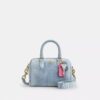 Mini Rowan-crossbodytas in ‘Loved Denim’ met bedels
