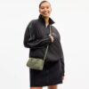 Mini Rowan-crossbodytas van kenmerkend leer