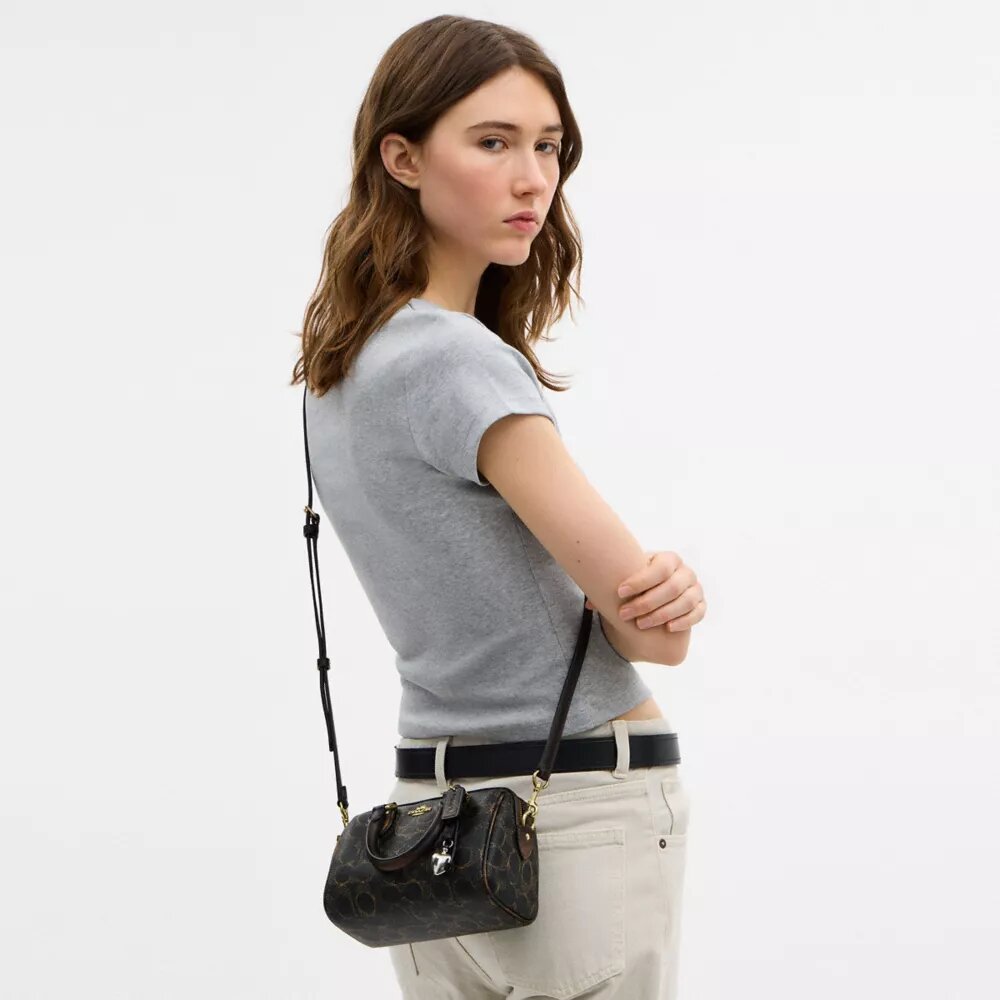 Mini Rowan-crossbodytas van ‘Loved’ Signature Canvas met bedels