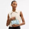 Mini Rowan-crossbodytas van Signature Canvas