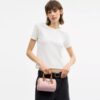 Mini Rowan-crossbodytas van Signature Canvas met bedels