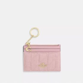Mini Skinny ID-etui van Loved Denim met doorgestikt patroon en bedels
