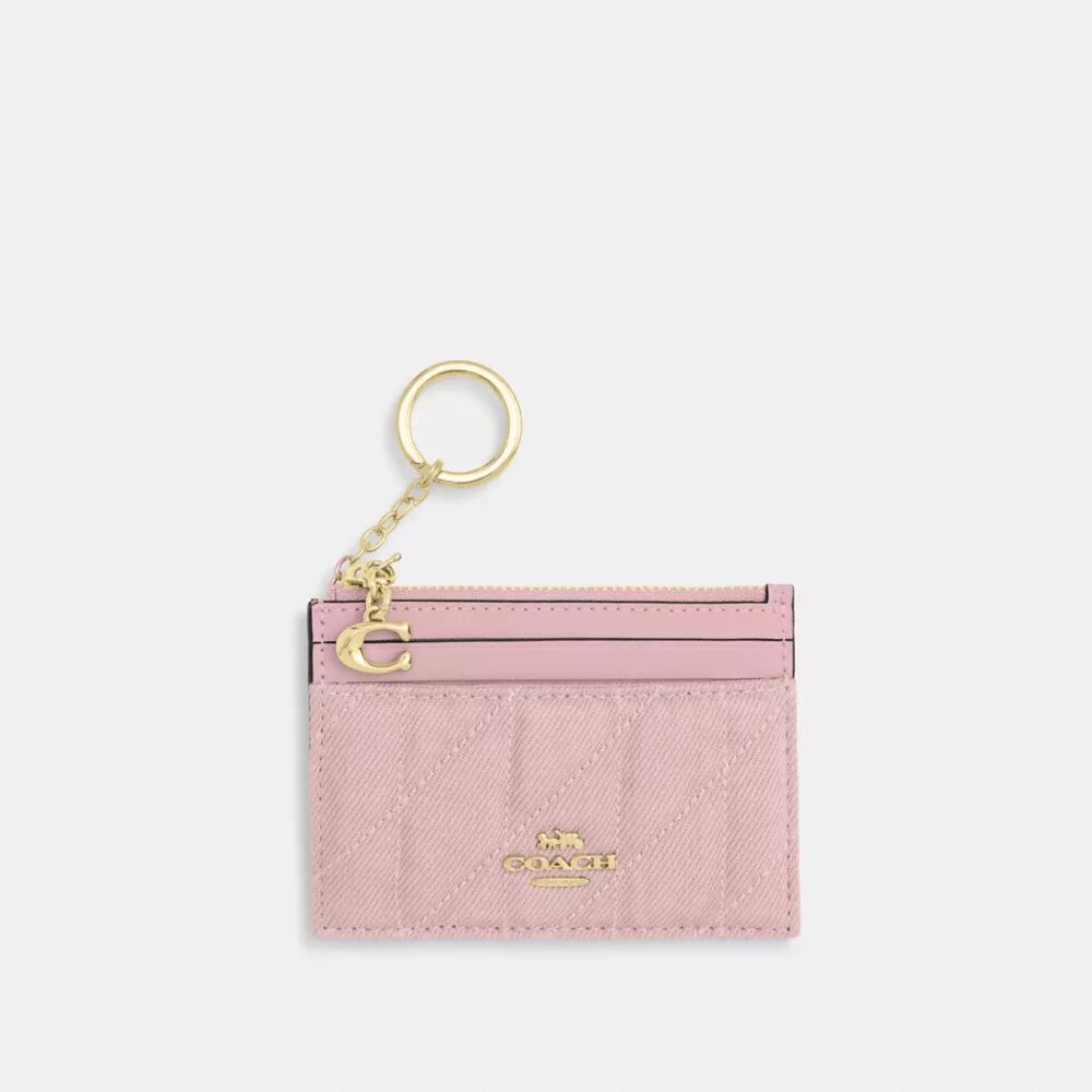 Mini Skinny ID-etui van Loved Denim met doorgestikt patroon en bedels
