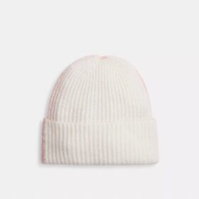 Muts met kleurblokken en rubberen patch
