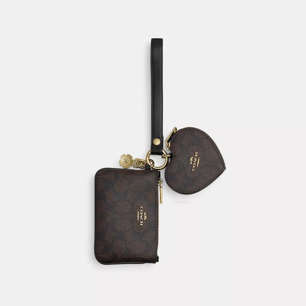Polsbandtasje en hartvormig etui van Signature Canvas met bedels