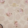 Polsbandtasje met rits in de hoek van Signature Canvas met bloemenprint