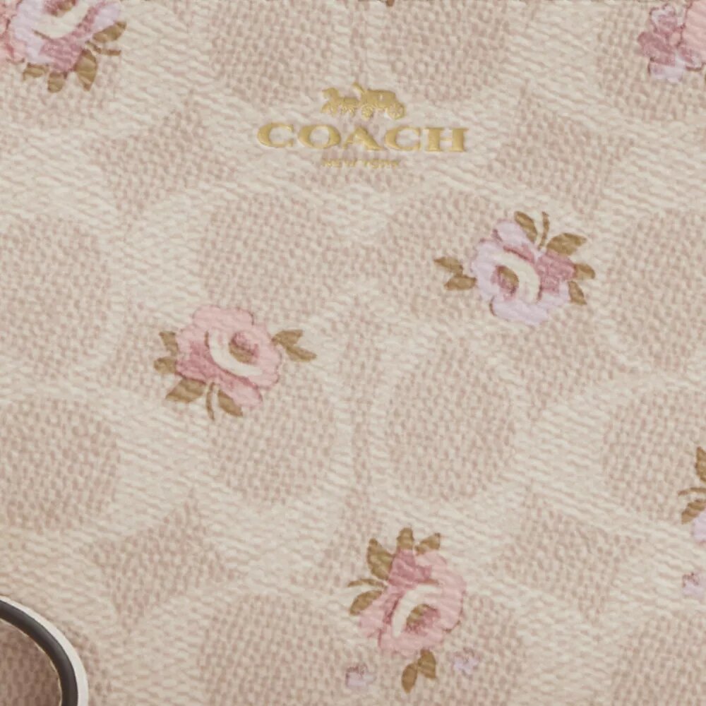 Polsbandtasje met rits in de hoek van Signature Canvas met bloemenprint