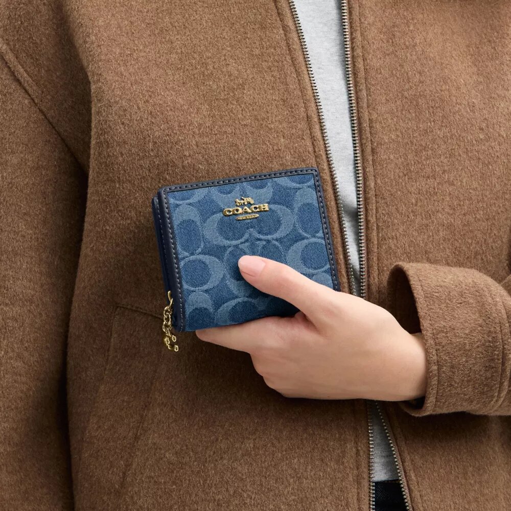 Portemonnee met drukknop in kenmerkend denim