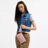 Portemonnee met dubbele rits in kenmerkende denim