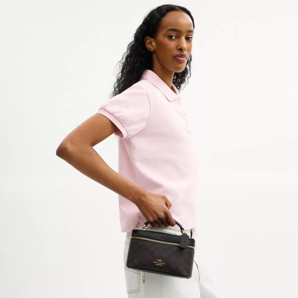 Rainer crossbodytas 18 in Signature Canvas