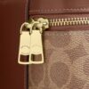 Rainer crossbodytas 18 in Signature Canvas