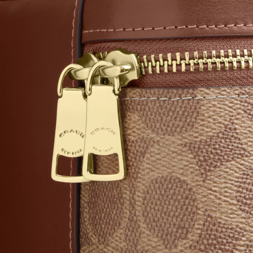 Rainer crossbodytas 18 in Signature Canvas