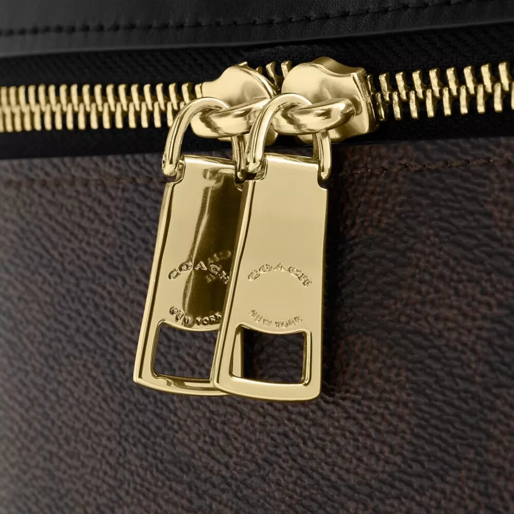 Rainer crossbodytas 18 in Signature Canvas