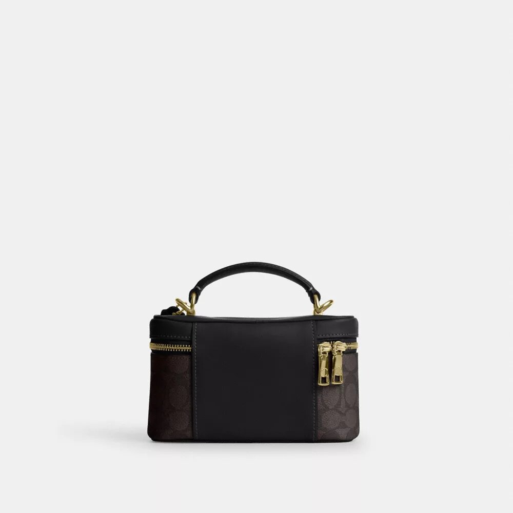 Rainer crossbodytas 18 in Signature Canvas