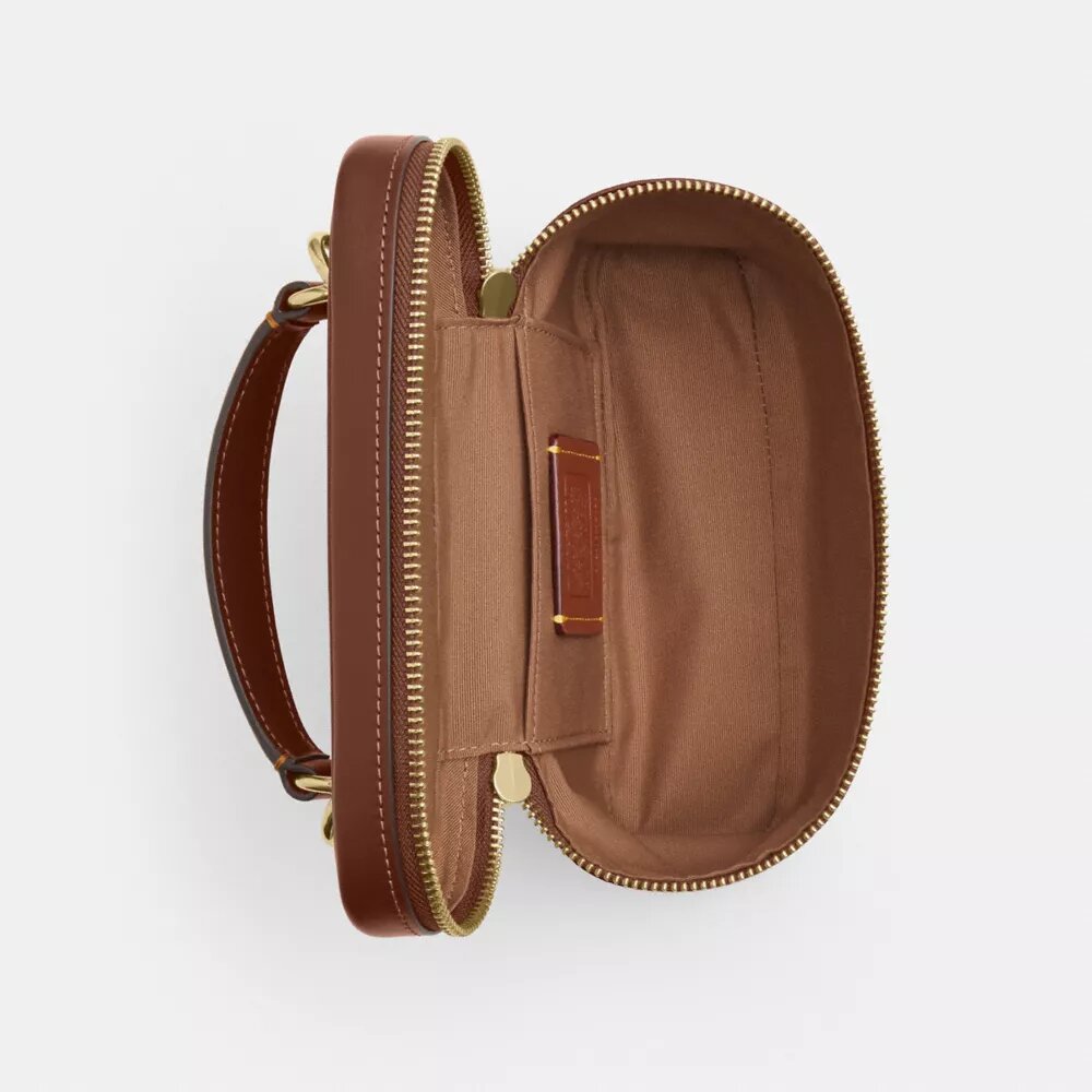 Rainer crossbodytas 18 in Signature Canvas