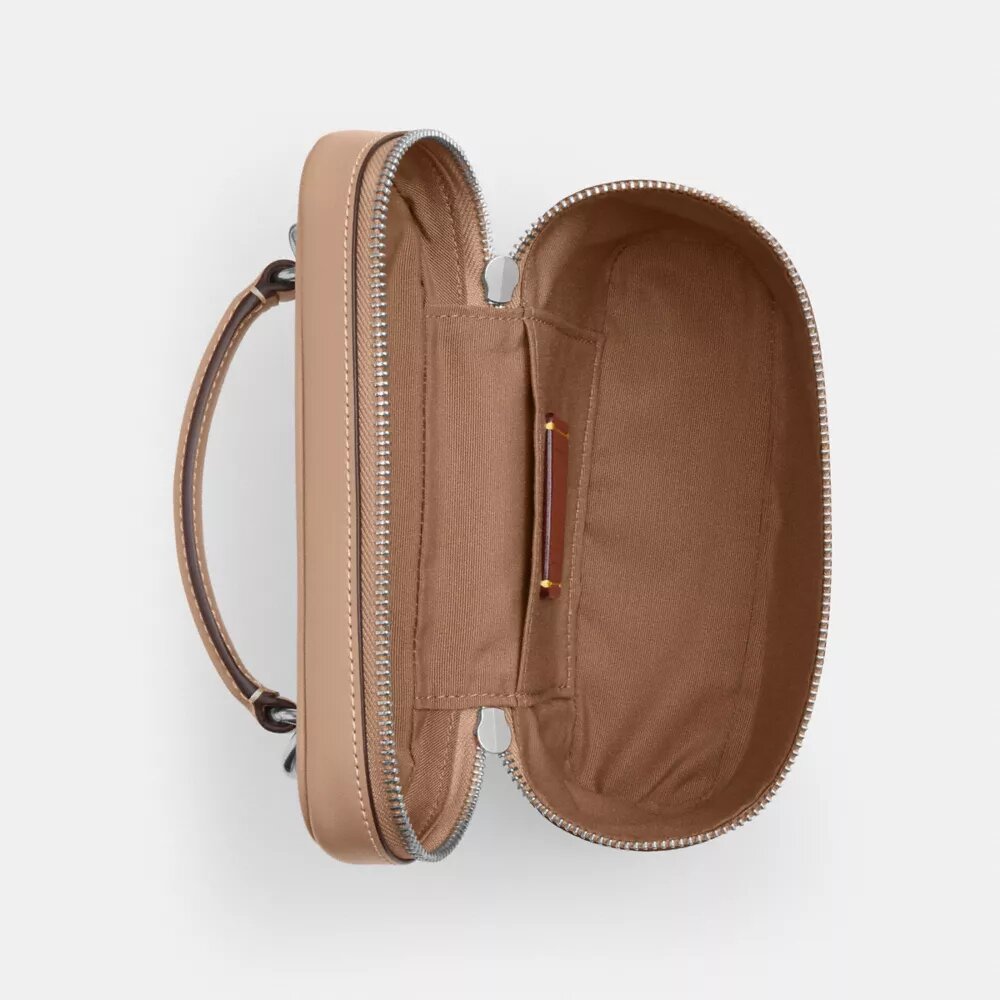 Rainer crossbodytas 18 in Signature Canvas