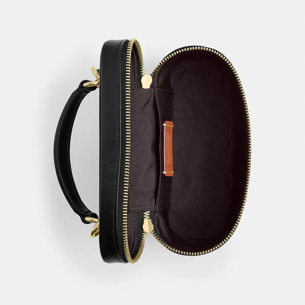 Rainer crossbodytas 18 in Signature Canvas