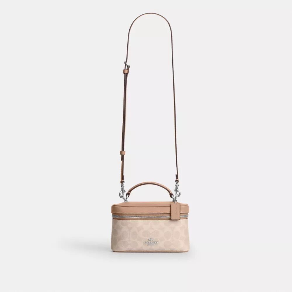Rainer crossbodytas 18 in Signature Canvas
