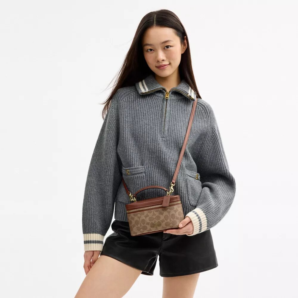 Rainer crossbodytas 18 in Signature Canvas