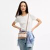 Rainer crossbodytas 18 in Signature Canvas