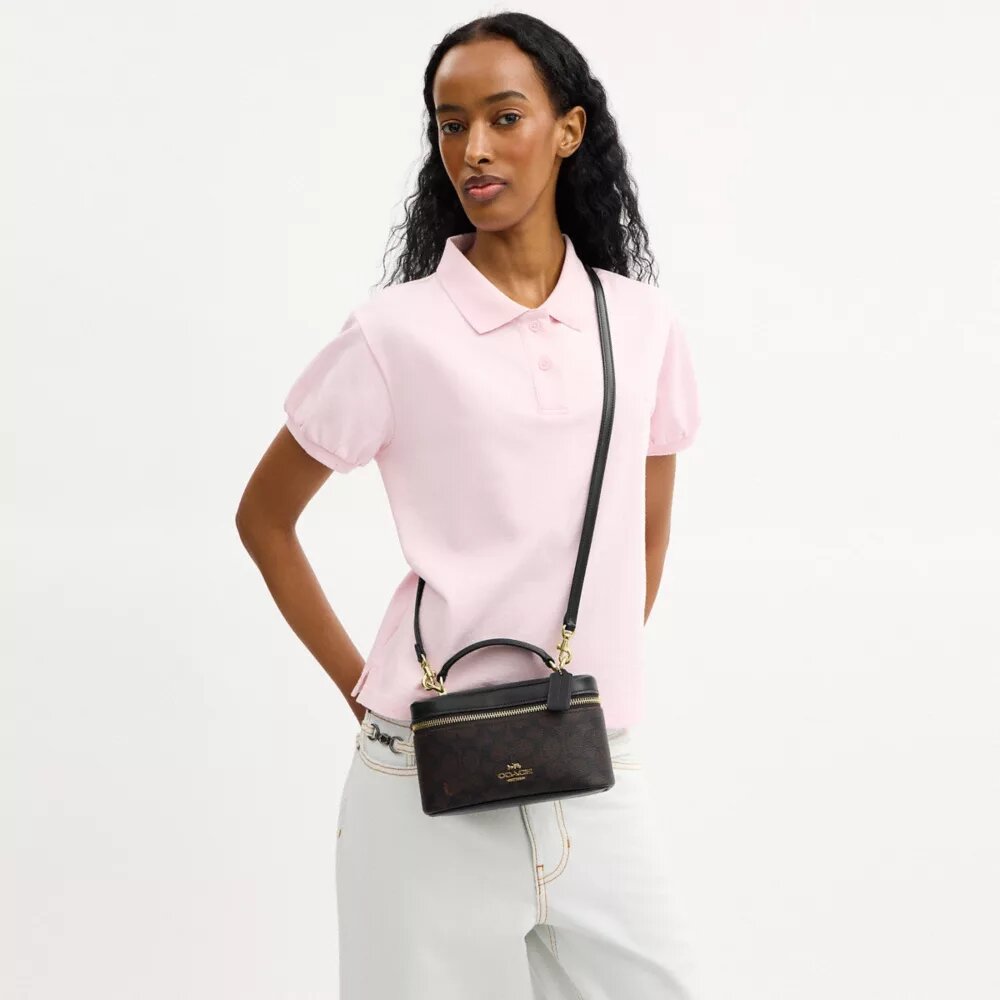 Rainer crossbodytas 18 in Signature Canvas