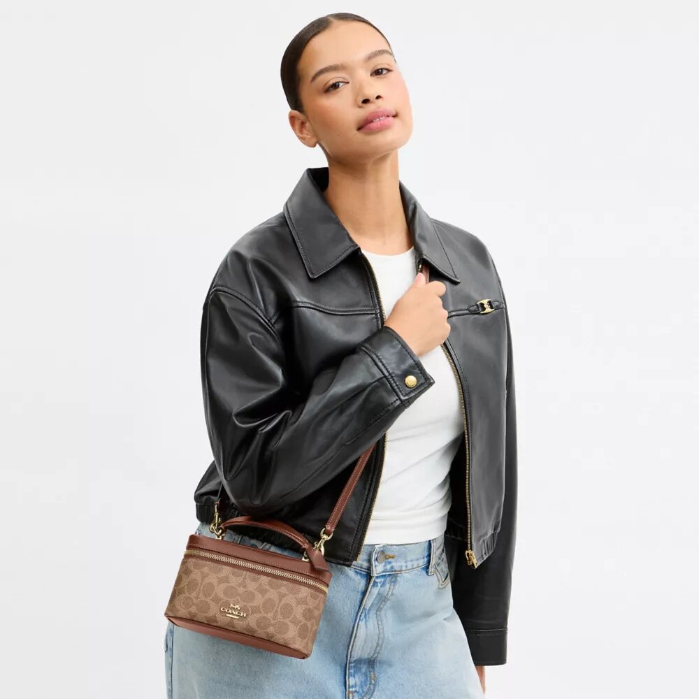 Rainer crossbodytas 18 in Signature Canvas