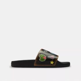 Rexy 10e verjaardag: badslippers met stickerprint