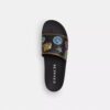 Rexy 10e verjaardag: badslippers met stickerprint