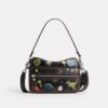 Rexy 10e verjaardag Dakota-crossbodytas van ‘Loved Leather’ met stickerprint