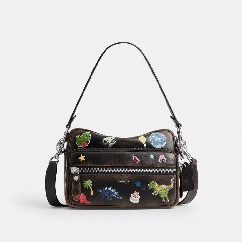 Rexy 10e verjaardag Dakota-crossbodytas van ‘Loved Leather’ met stickerprint