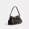 Rexy 10e verjaardag Dakota-crossbodytas van ‘Loved Leather’ met stickerprint