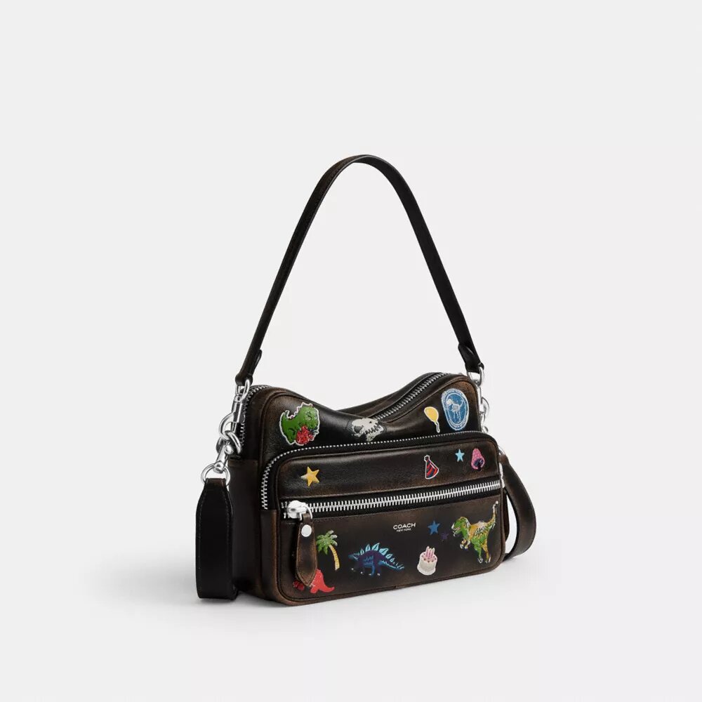 Rexy 10e verjaardag Dakota-crossbodytas van ‘Loved Leather’ met stickerprint