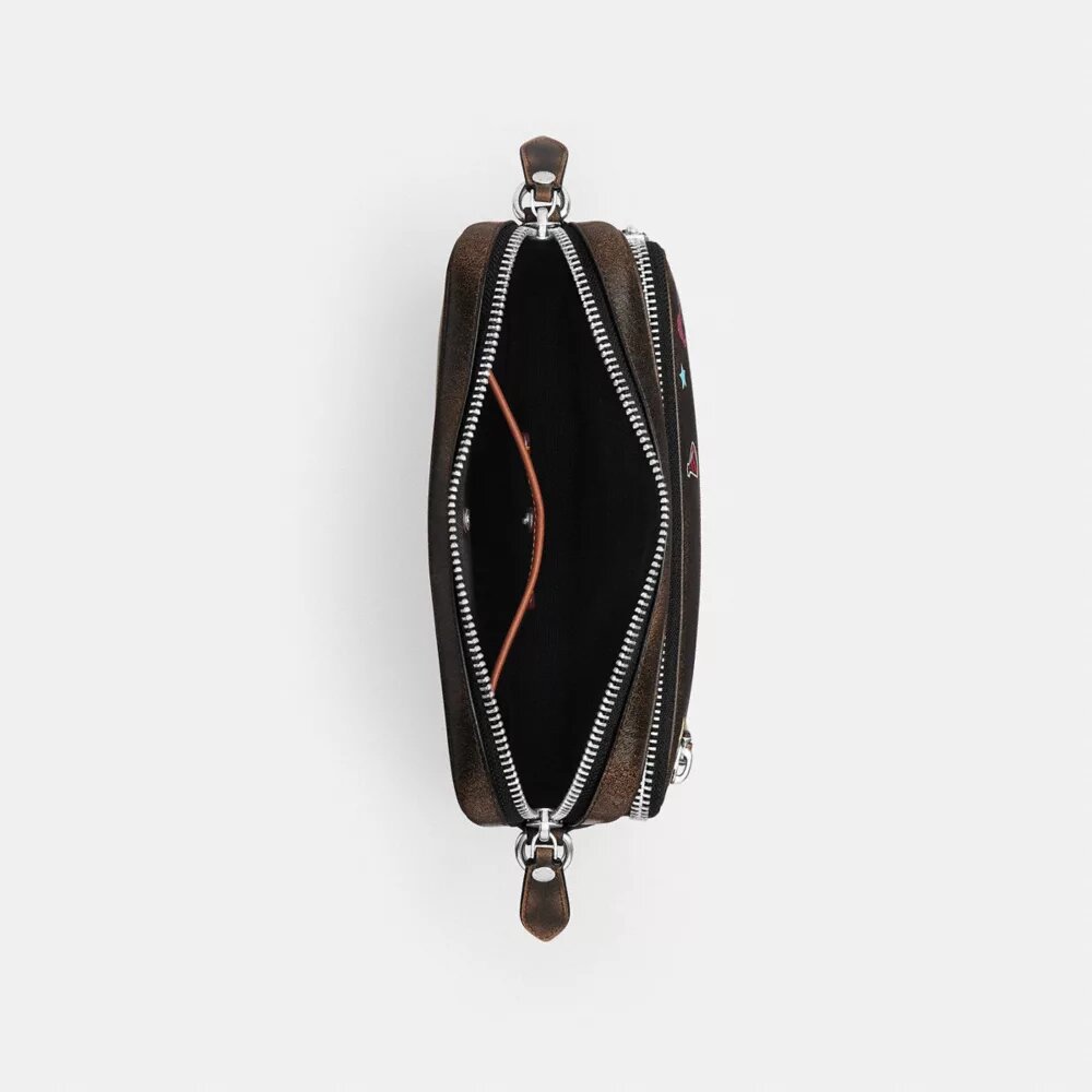 Rexy 10e verjaardag Dakota-crossbodytas van ‘Loved Leather’ met stickerprint